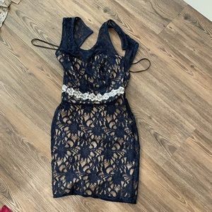 Blue lace dress with open back and rhinestone belt